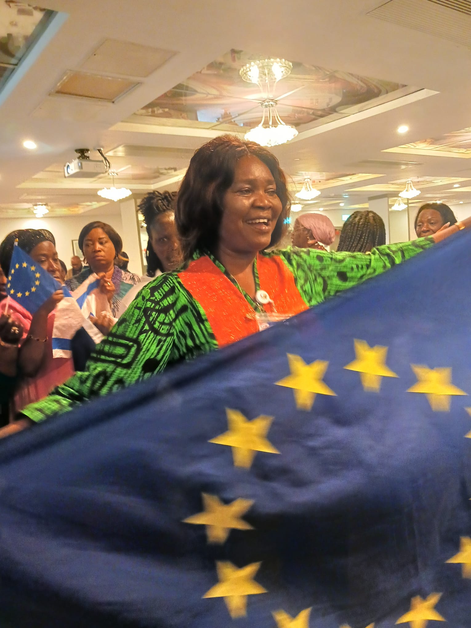 Sis Ngozi holding the Europe flag